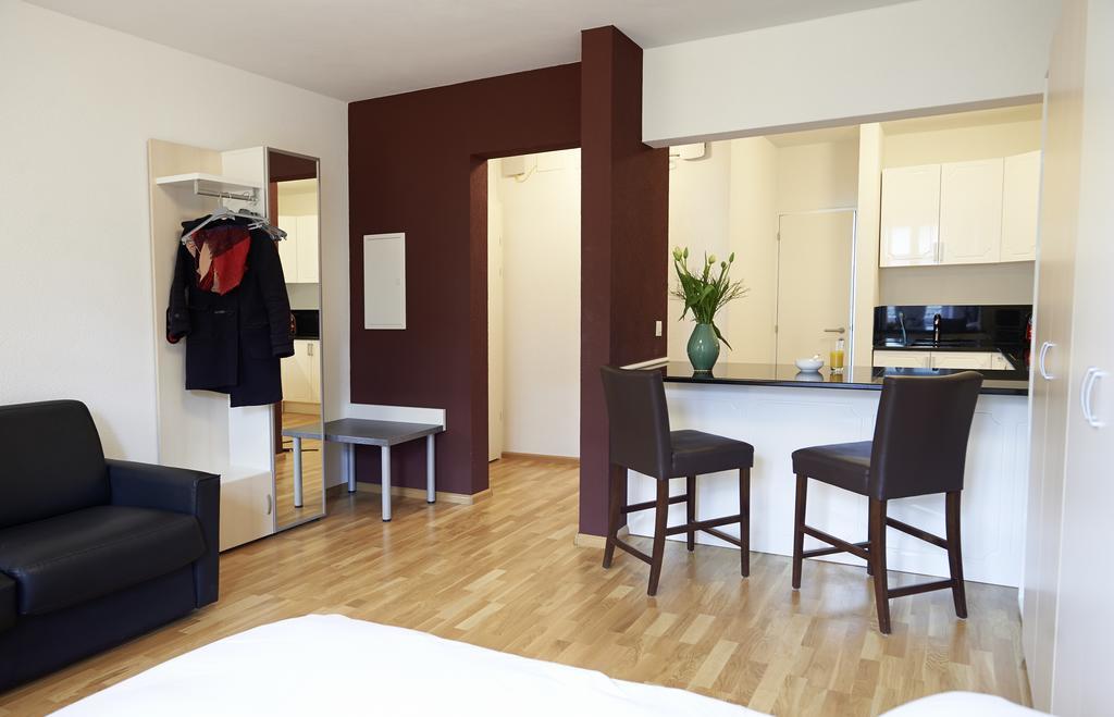 Residence Apartments By Hotel Du Commerce Basilea Habitación foto